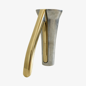 noeddeknaekker i staal med guld haandtag